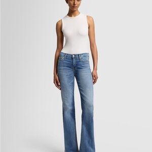 7 For All Mankind - Dojo mid waist , flared blue jean. Size 26